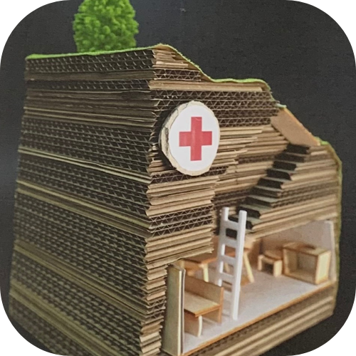 Photo of underground shelter design constructed with layers of lasercut cardboard